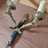 Pair of Empire-style wall sconces in gilded bronze and green lacquer.