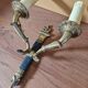 Pair of Empire-style wall sconces in gilded bronze and green lacquer.