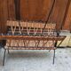 Metal and wicker magazine rack