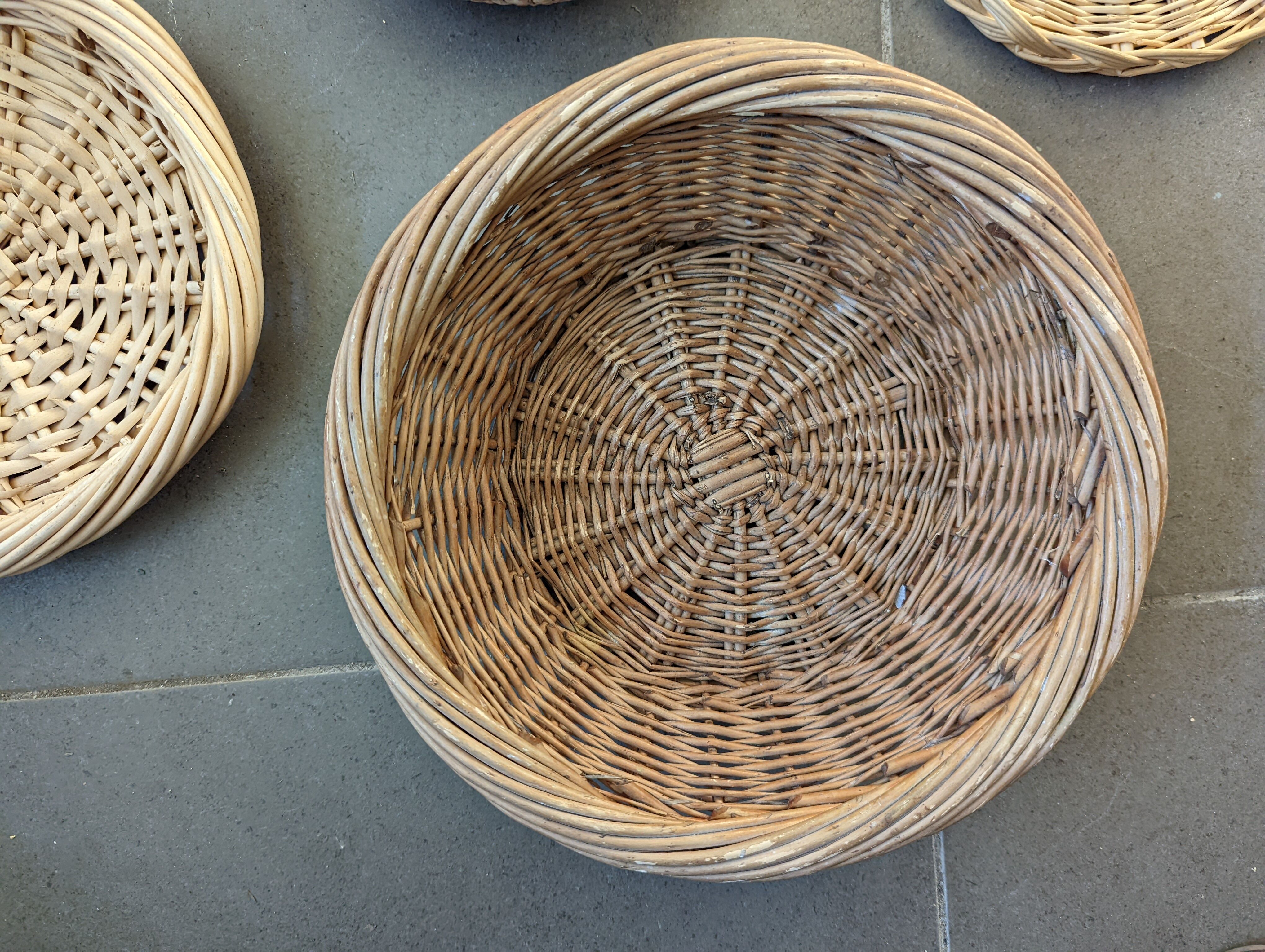 Wall composition of 7 wicker baskets