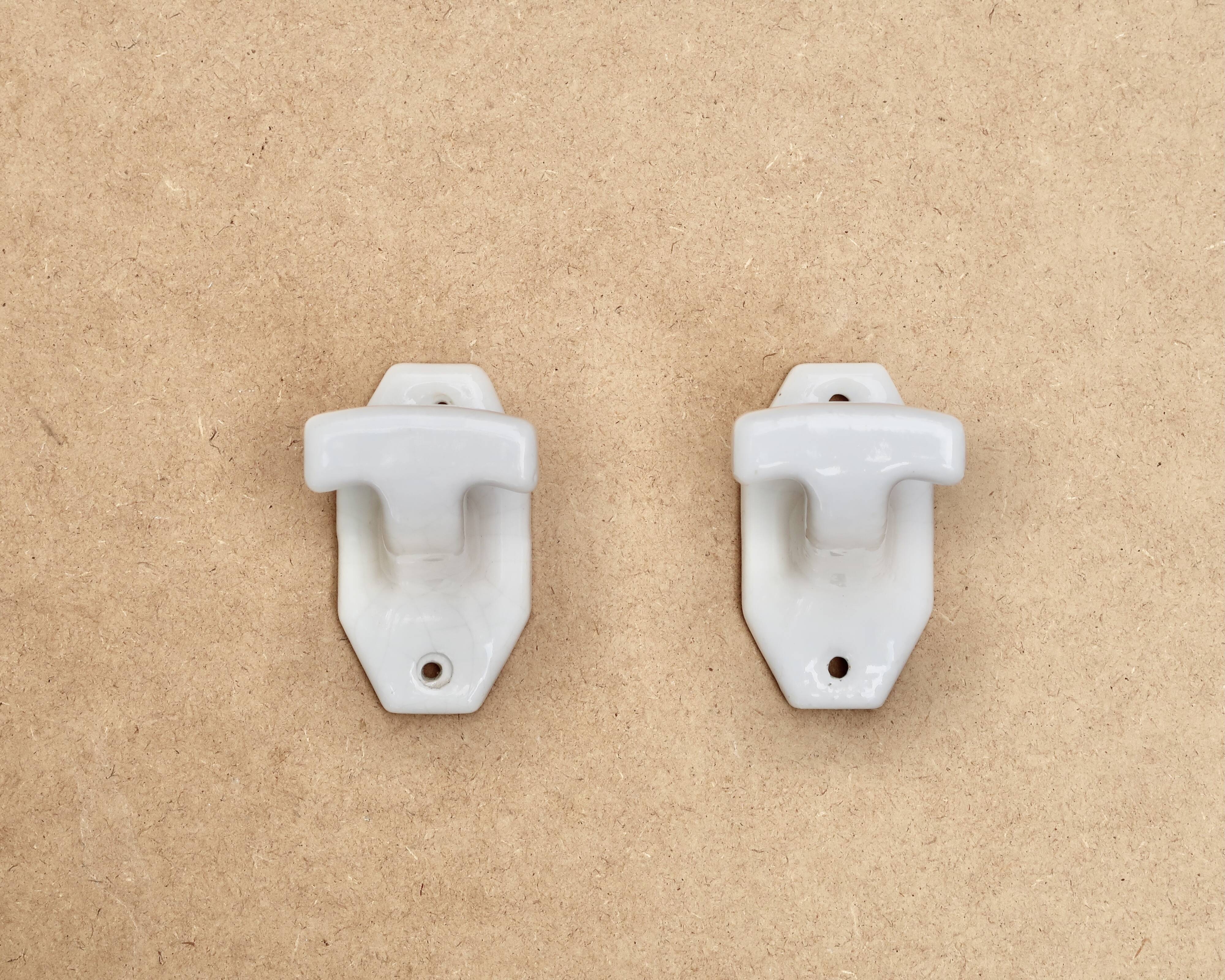 White porcelain coat hooks, 1950s