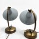 Pair of modernist "goose neck" table lamps in brass, Stilnovo style.