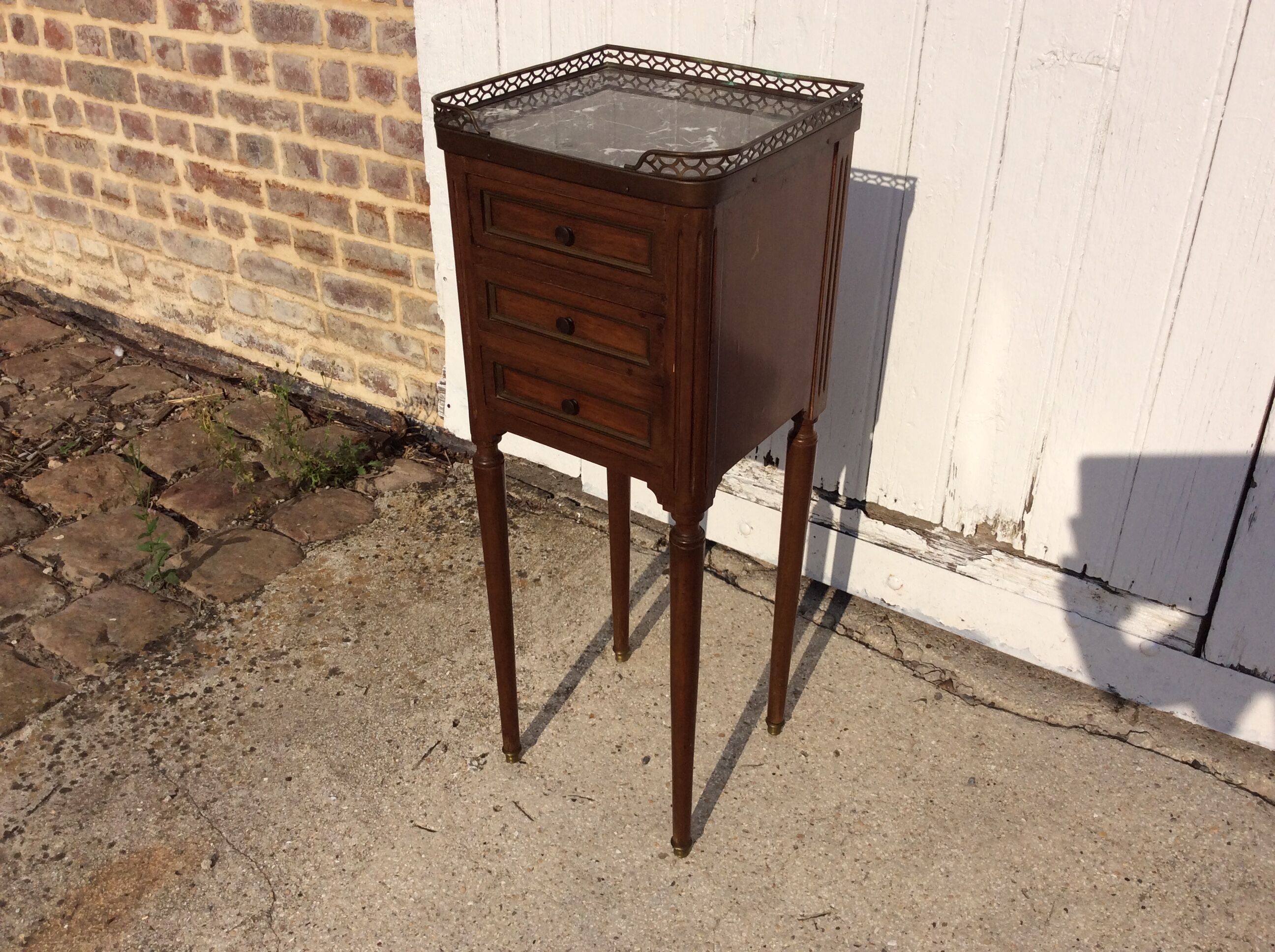 Beside table XVlllème