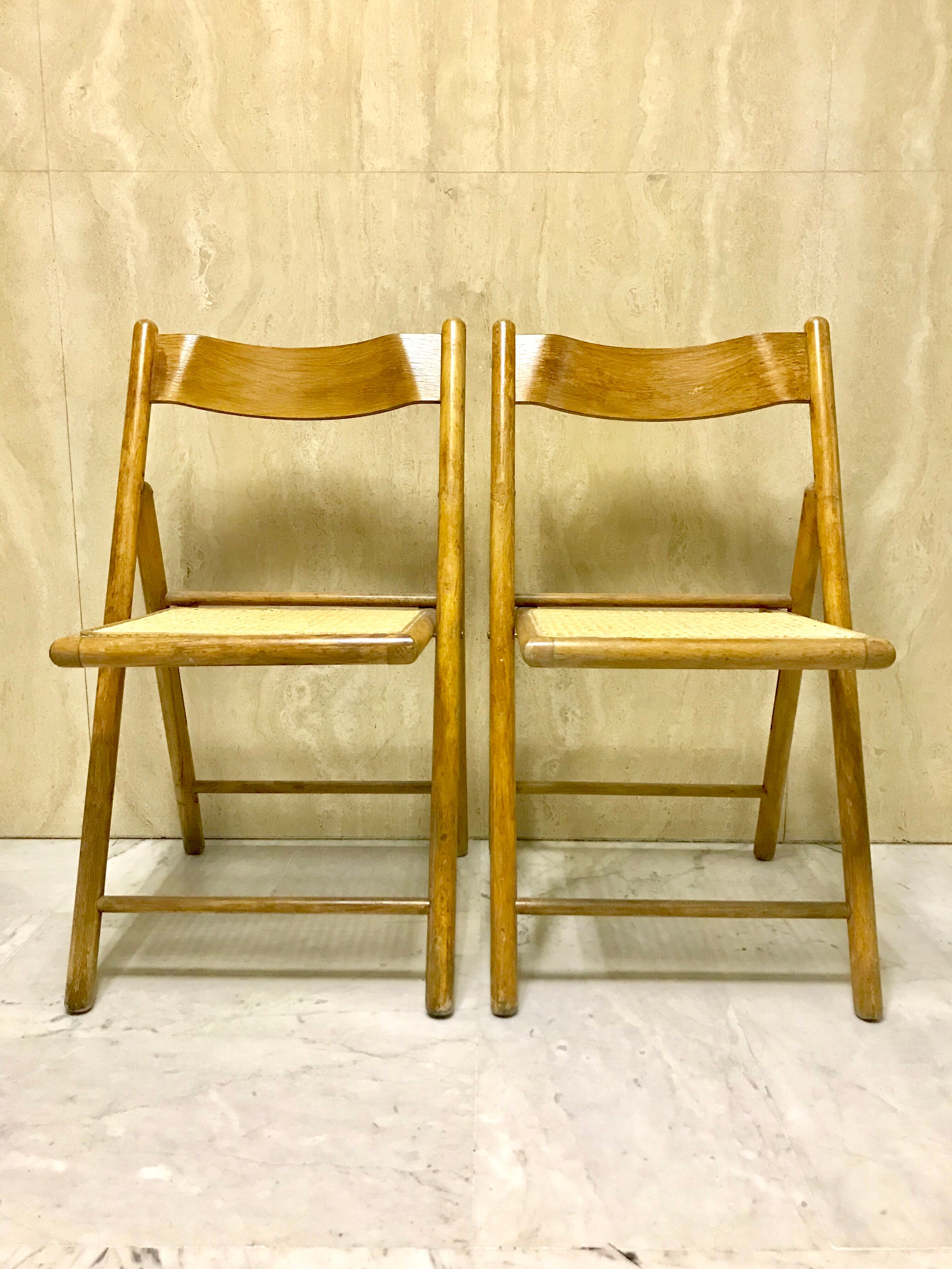 Duo of canned folding chairs