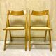 Duo of canned folding chairs