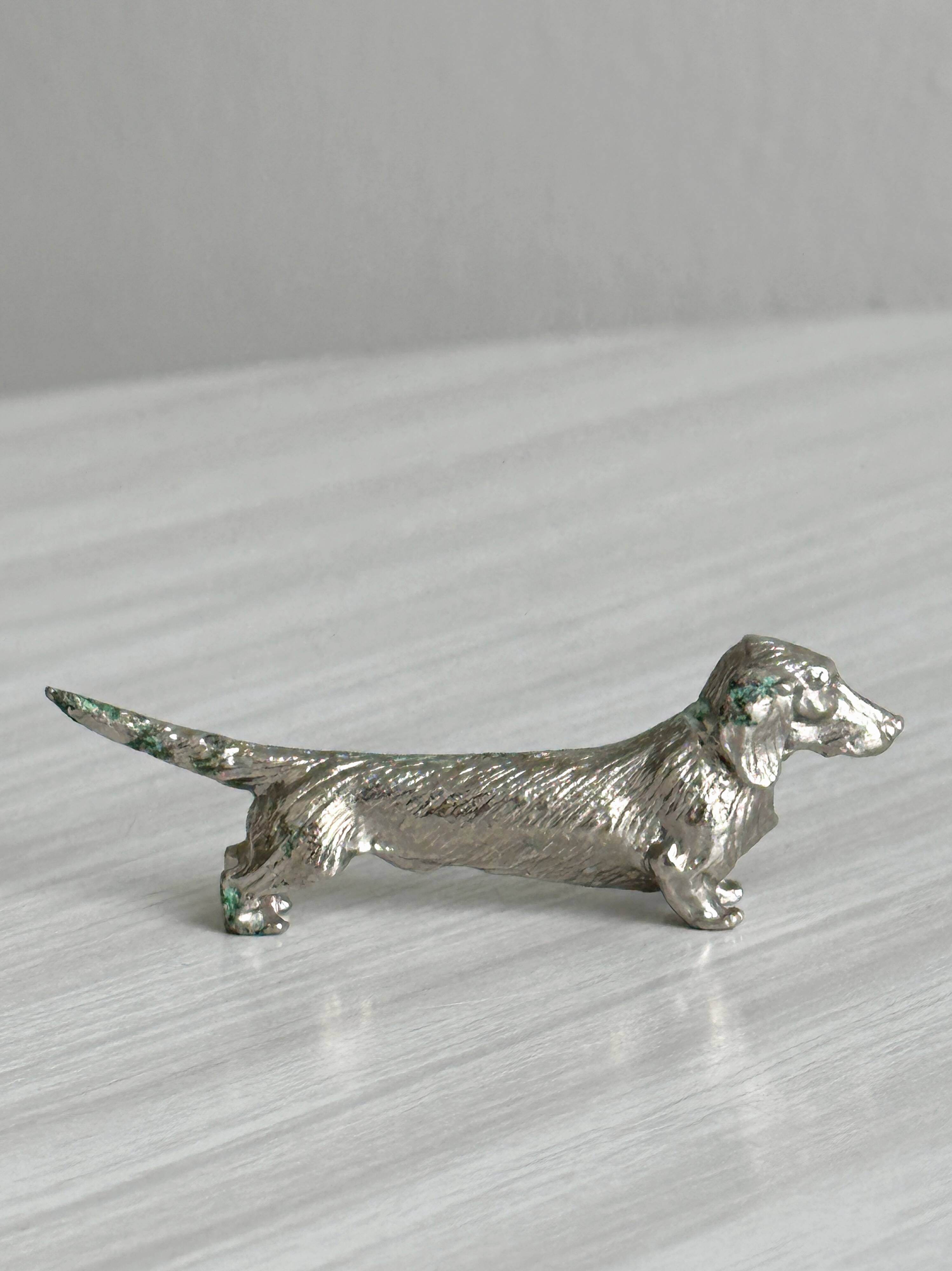 Set of 8 dachshund-shaped knife rests