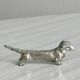 Set of 8 dachshund-shaped knife rests