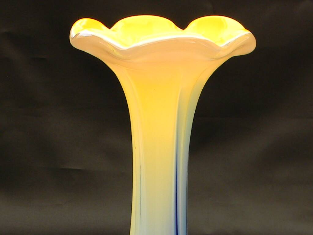 Small blown glass vase in murano style.