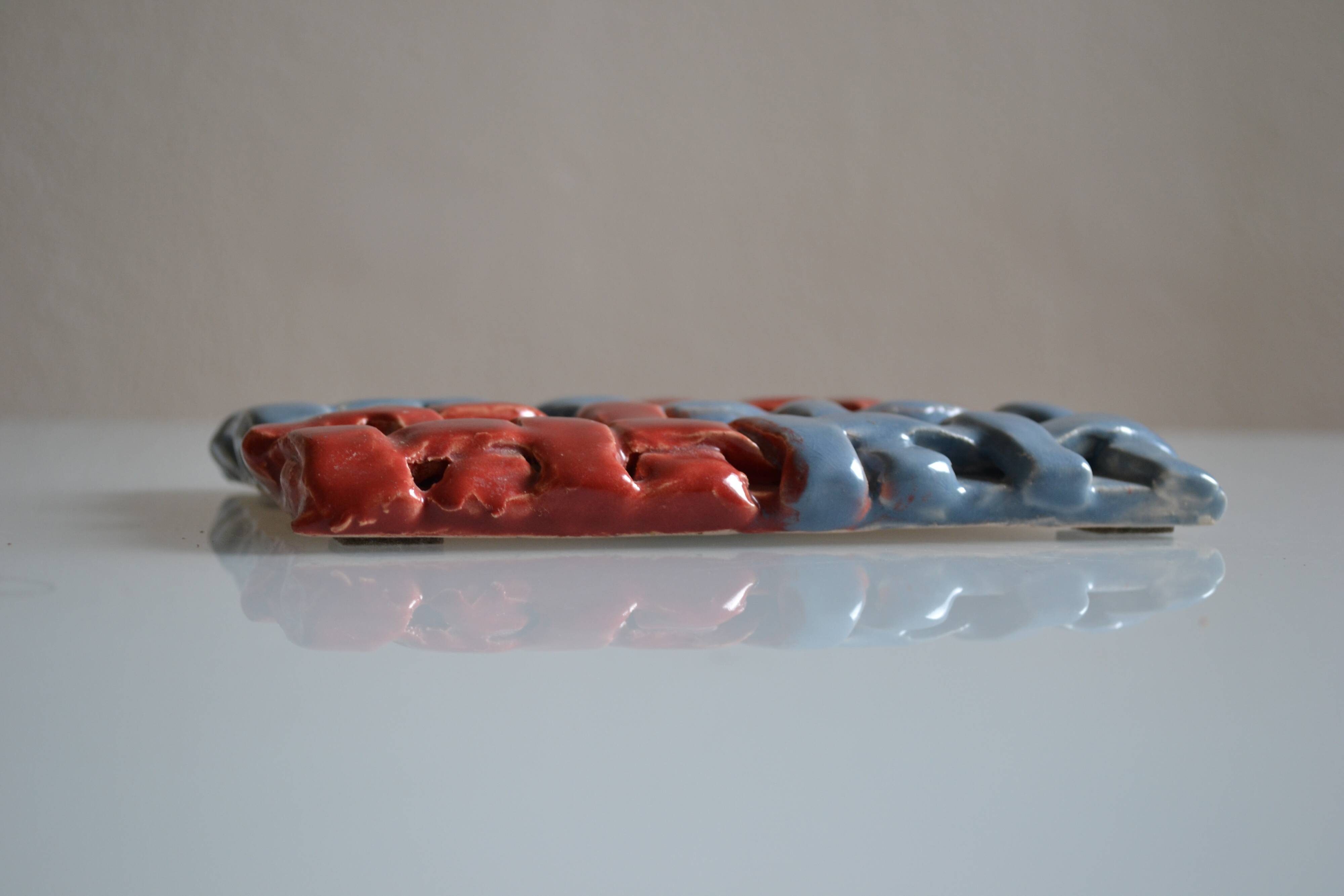 Vintage 1970 woven ceramic rest or trivet