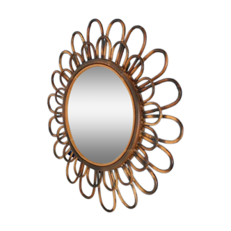 Smoked rattan flower shaped mirror