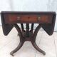 19th-century English style mahogany drop-leaf table.