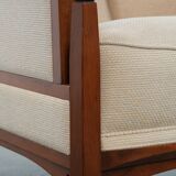 Art Nouveau design armchair with a luxurious light fabric upholstery