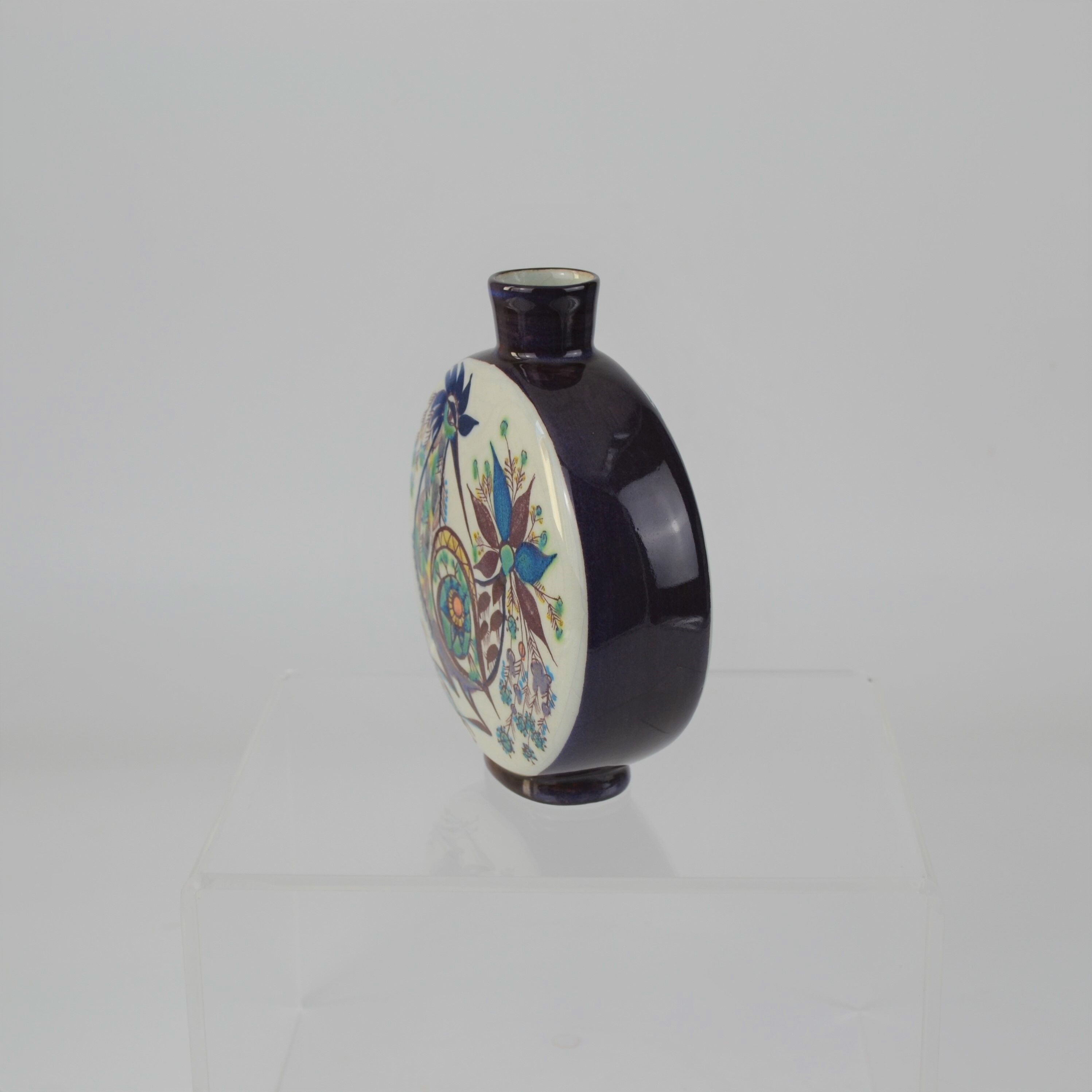 Earthenware bottle from Marianne Johnson's Tenera series for Aluminia