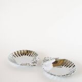Pair of worked stainless steel shell trinket trays, 1970