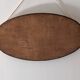 Miroir ovale Art déco en bois doré vers 1920