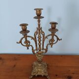 Bronze candlestick with lion head decoration