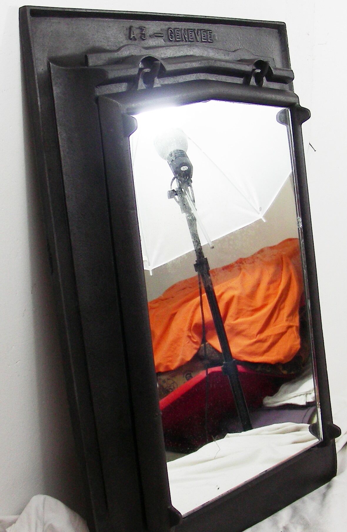 Former industrial cast iron mirror, 50x71cm