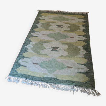 Green Scandinavian kilim carpet