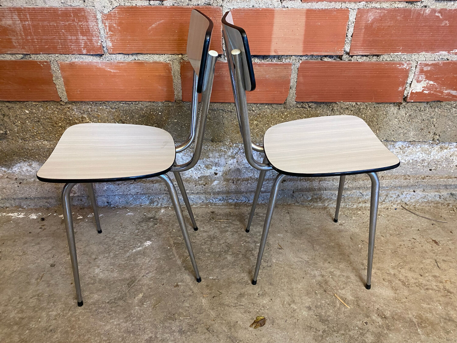 Pair of antique chrome metal chairs + white formica seat & back
