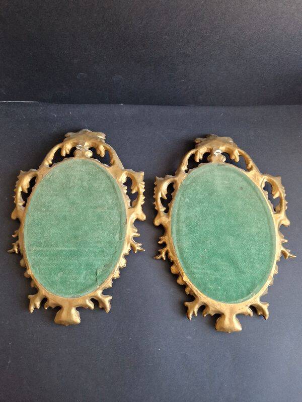 Pair of gilded rococo style mirrors, 1970s