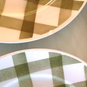 Set of six flat plates and one Moulin des Loups bowl, green tablecloth model/1950s-1960s