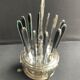 12 "Apollonox" fruit knives on silver metal support