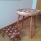 Rattan table and its small bench