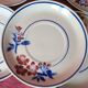 Set of 7 porcelain dessert plates