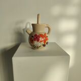 Pitcher ball in sandstone with floral pattern