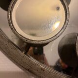 Mirror with round facets design