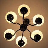 Metal chandelier and glass globes