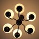 Metal chandelier and glass globes