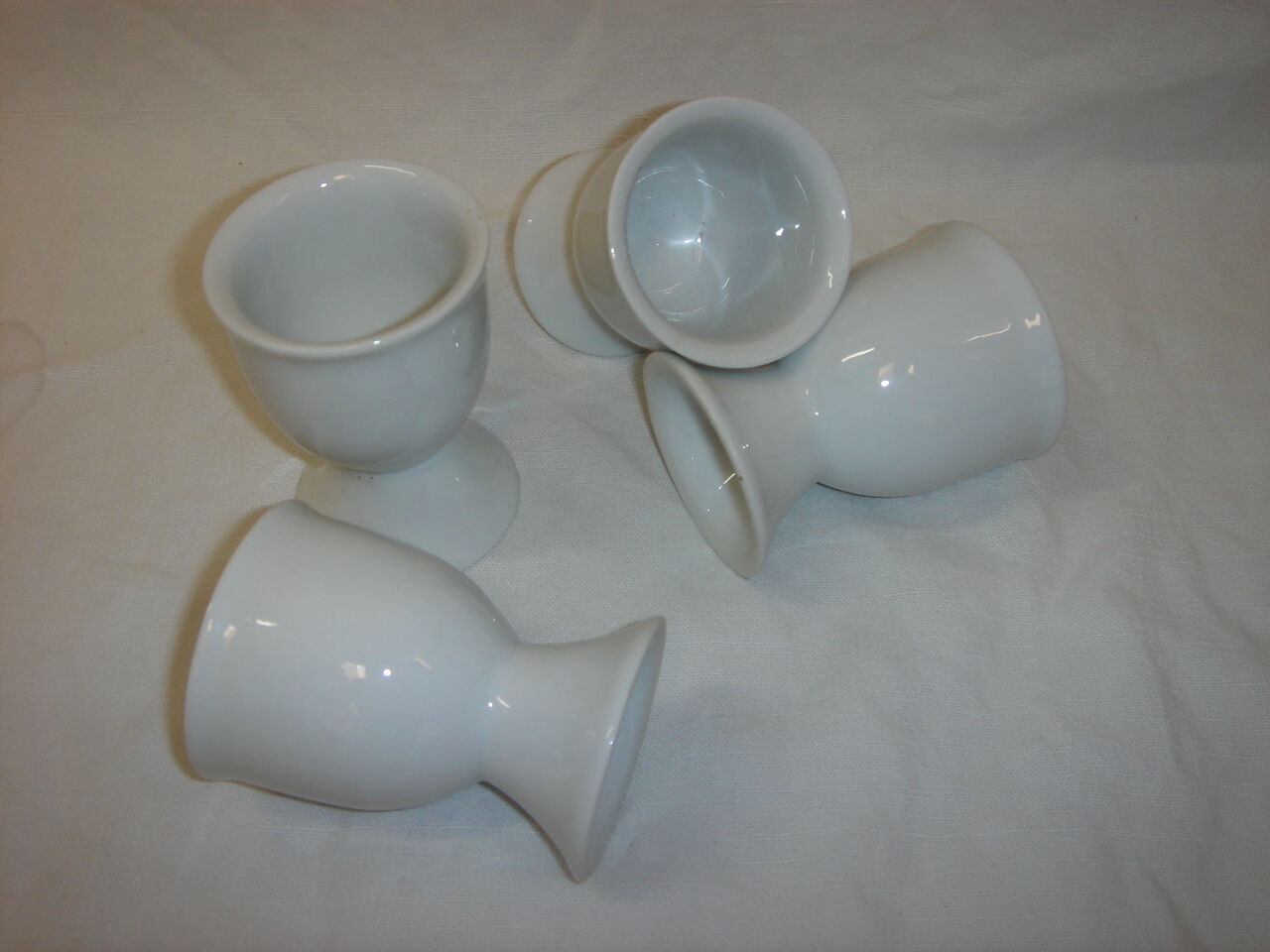 4 white porcelain cockroaches from 1970