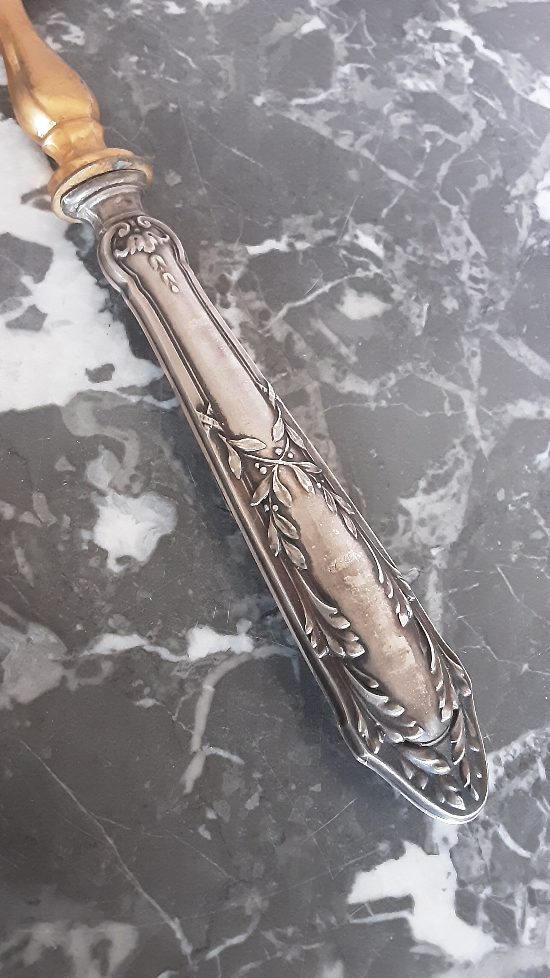 Old brass and silver pie shovel