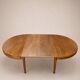 Vintage extendable round table, French made from the 1960s/70s.