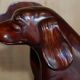 Pair of hardwood library steps with carved dogs, Regency style.