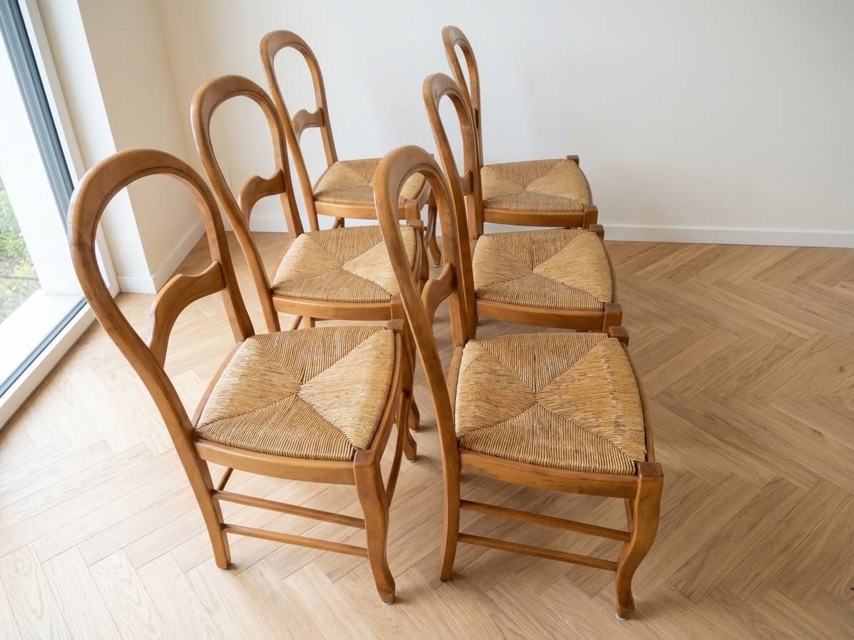 Set of 6 traditional wooden chairs with woven straw.