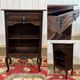 Oak accent furniture bookshelf with a drawer, early 20th century work.