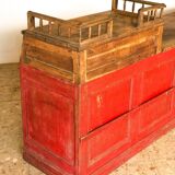 Former red patina and oak tray trading counter