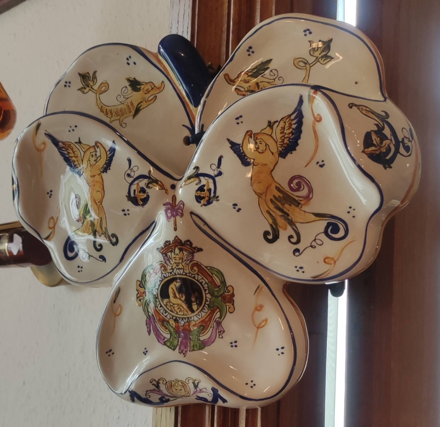 Old ceramic flower girl wall vase