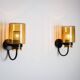 Pair of black metal wall lamps with yellow shades and inner diffuser