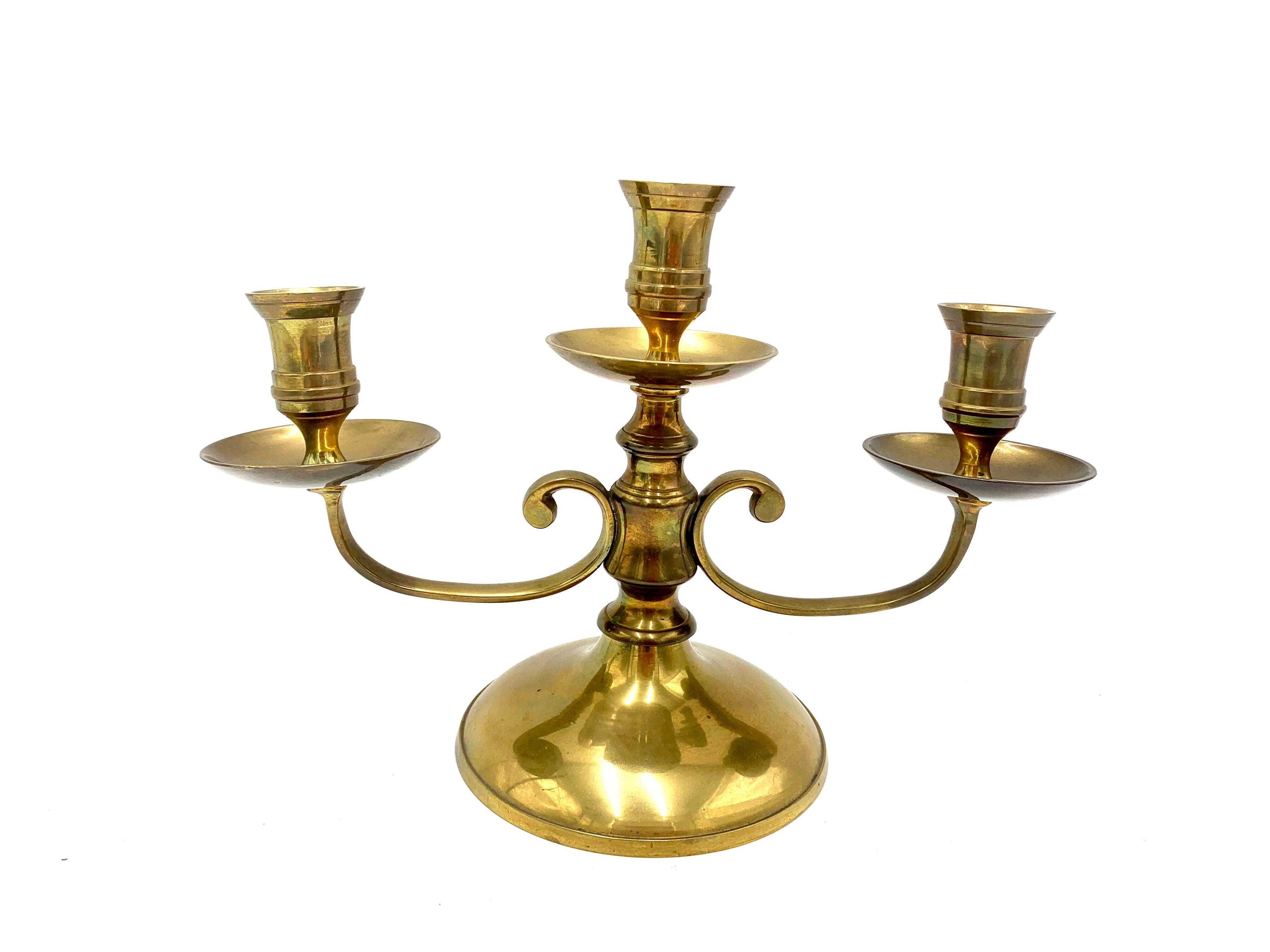 Brass three-arm candlestick