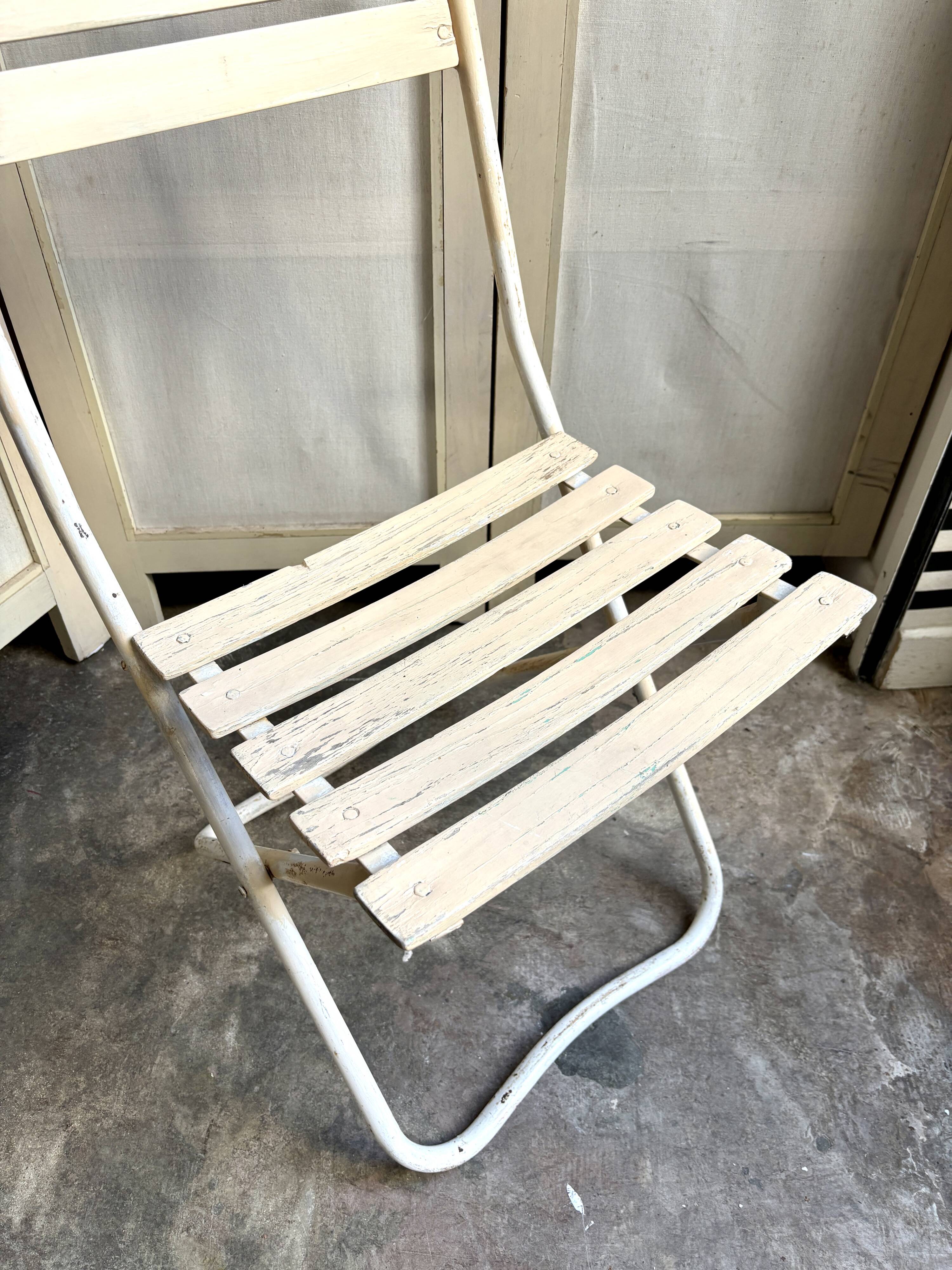 Beige wooden and metal folding chair