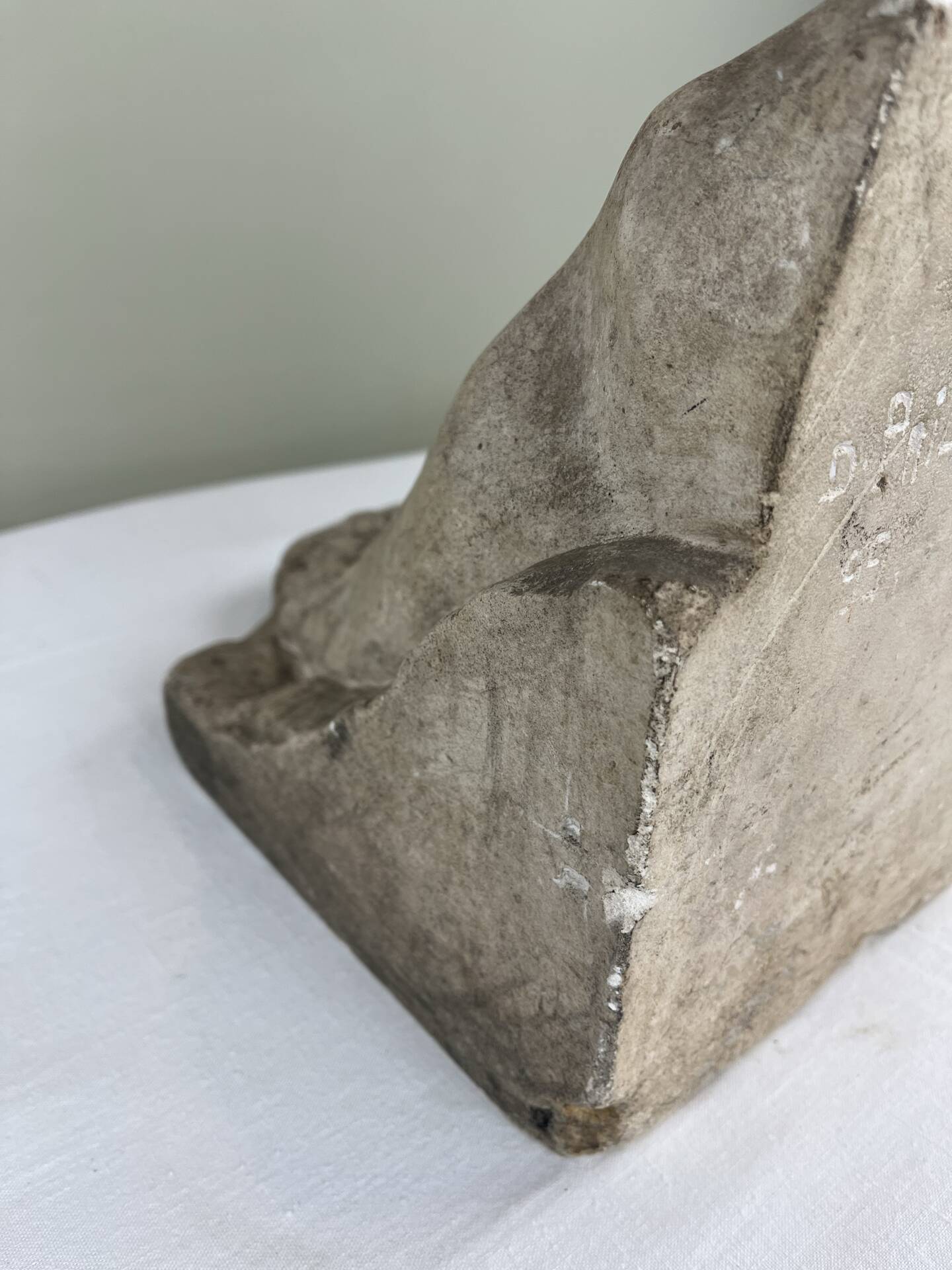 Stone sculpture, two feet on a block, signed D. Paillot.