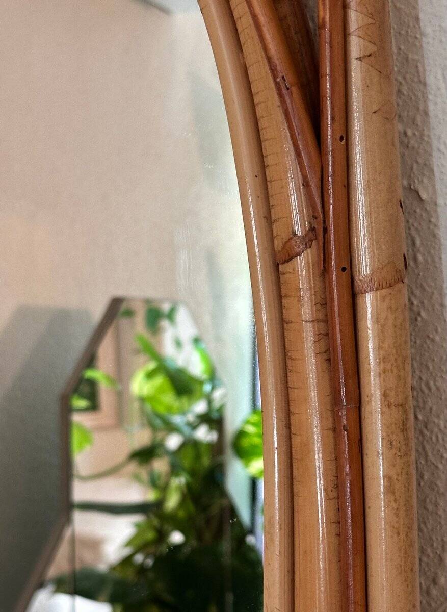 Arched Spanish wall mirror in rattan and bamboo, 1960s.