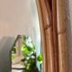 Arched Spanish wall mirror in rattan and bamboo, 1960s.