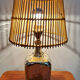 Lampe en verre et rotin