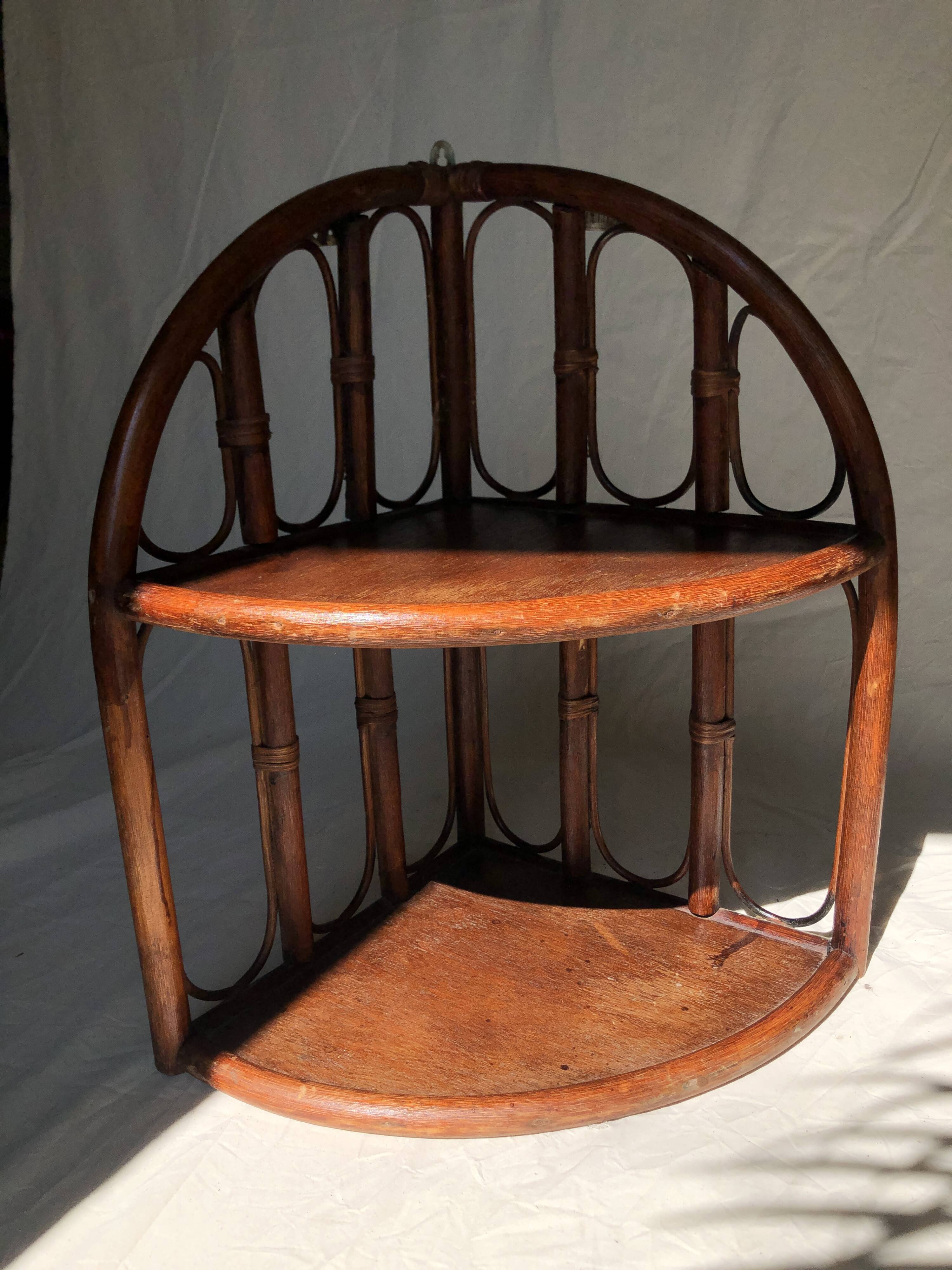 Corner shelf in dark rattan, 60s/70s