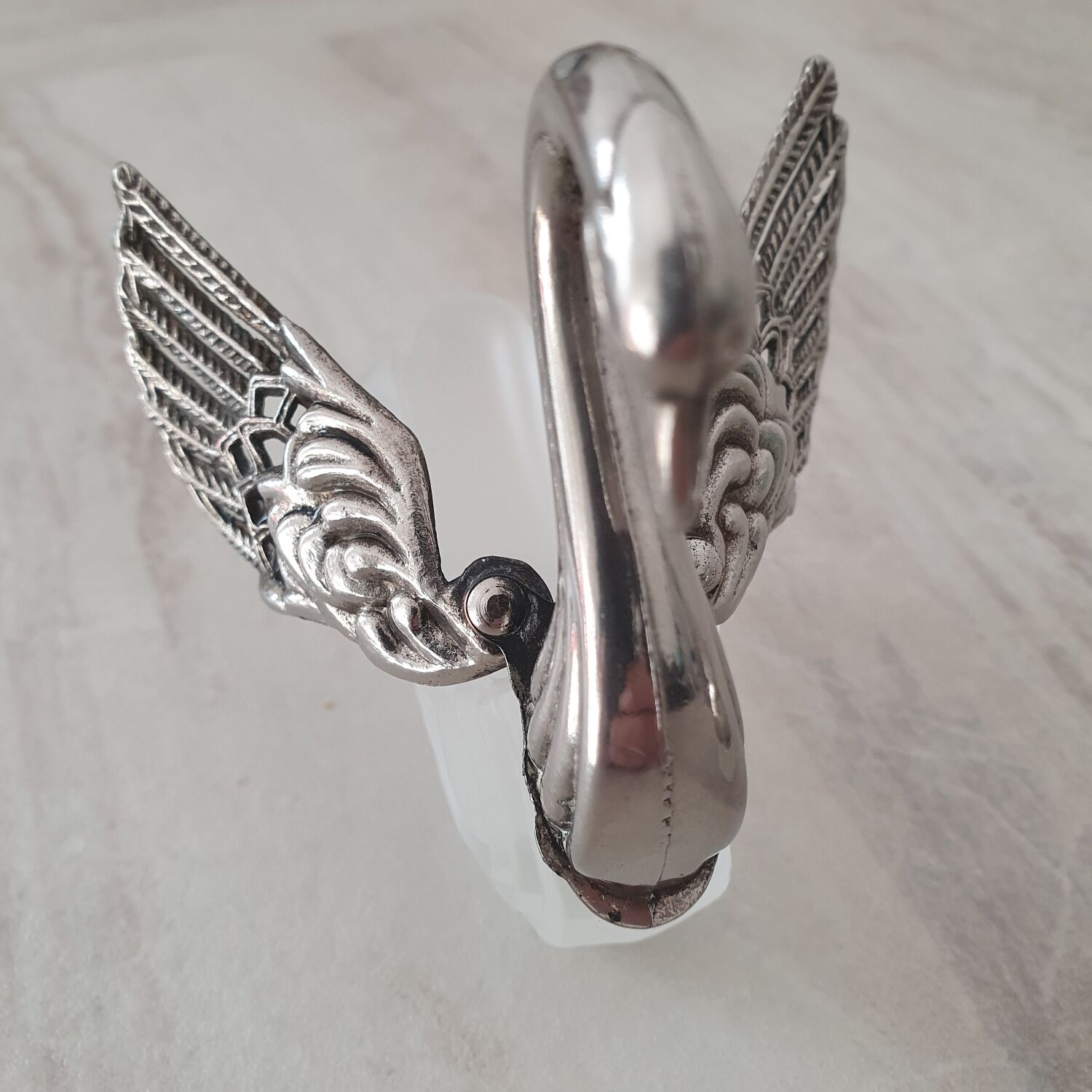 Two frosted glass swan salt cellars with silver plating.