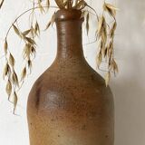 Old terracotta bottle